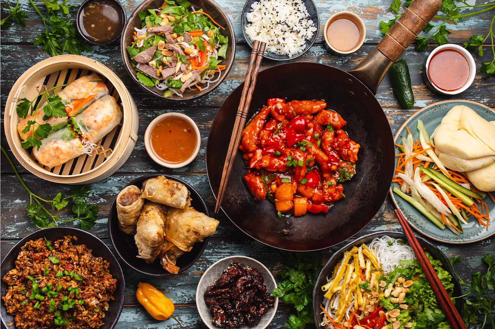 Evergreen Thai office lunch catering spread with shared mains rice spring rolls and salad for a downtown Toronto team