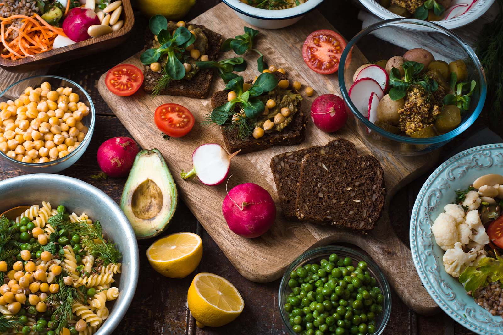 Evergreen Thai vegetarian-friendly catering inspiration with vegetables salads legumes and shared plates for a mixed team